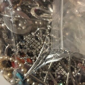 Broken and tangled jewelry for crafts or repair non is wearable.